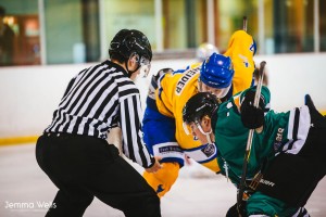 Jordan Wood drops the puck in an NZIHL game.